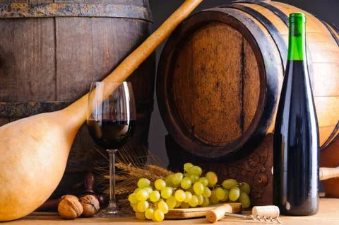 Red wine and wooden barrels Stock Photos