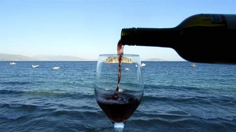 Red wine in the beach Stock Footage