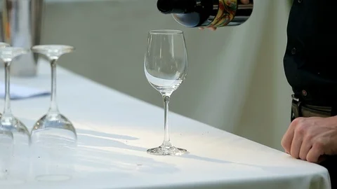Red wine being poured into single glass A Stock Footage 109653451