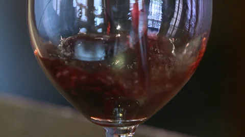 RED WINE BEING POURED INTO WINE GLASS CLOSE UP HD HIGH DEFINITION 1080 Stock Footage 35404800