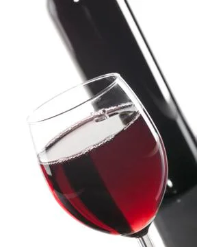 Red wine bottle and glass Stock Photos