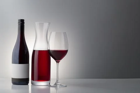 Red wine on bright background. Stock Photos