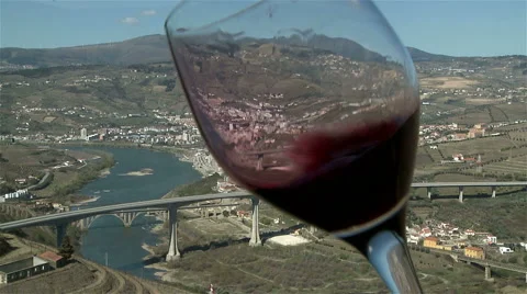 Red wine with Douro Valley in background. Stock Footage 62471840