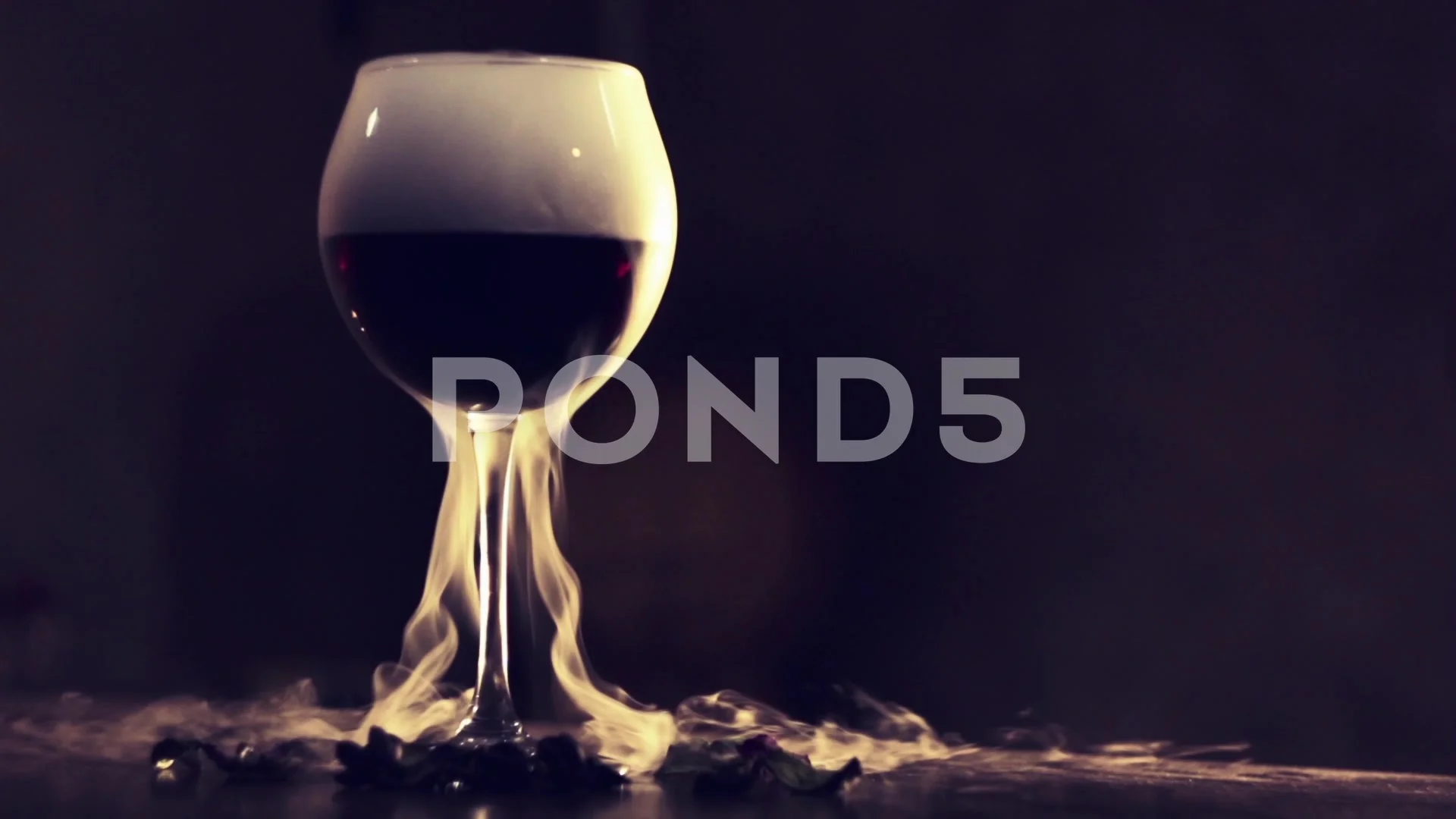 Red wine in glass with dry ice Stock Video Pond5