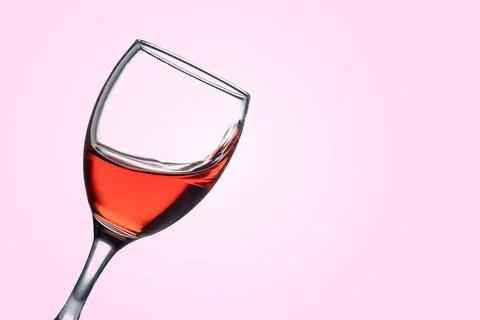 Red wine glass isolated from the bottom with copy space Stock Photos