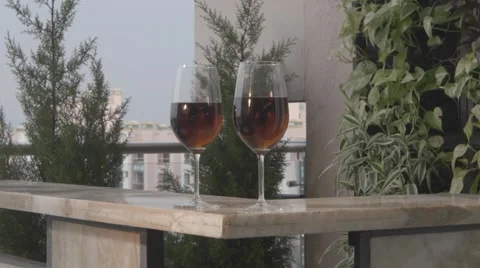 Red Wine Glasses in Balcony Stock-Footage 55440319