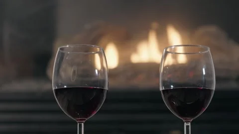 Red Wine Glasses by Fireplace Stock-Footage 333669829