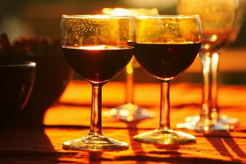 Red wine glasses on table Stock Photos
