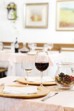 Red wine glasses on table in restaurant Stock Photos