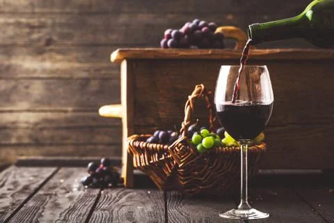 Red wine with grapes Stock Photos