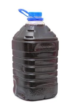 Red wine in plastic container Stock Photos