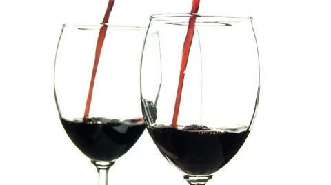 Red wine pour seeing double Stock Footage 10599698