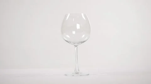 Red wine pour on white Stock Footage 63812228