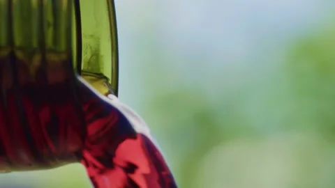 Red Wine Poured from bottle close up Stock Footage 159587820