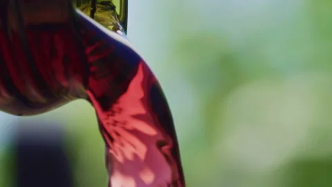 Red Wine Poured from bottle in ecu slo mo Stock Footage 159590009