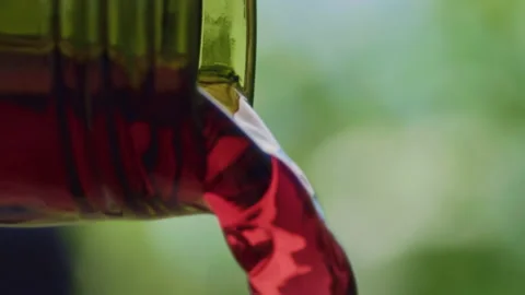 Red Wine Poured from bottle in slow motion Video stock 159588706