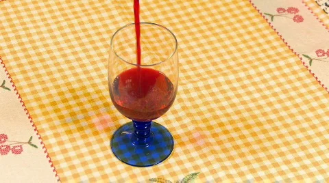 Red wine poured into the cup  Video stock 708176