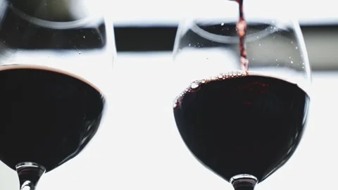 Red Wine Poured into Glasses Stock Footage 300487790