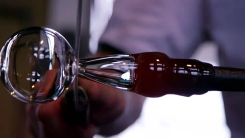 Red Wine Poured into Tilted Stemmed Glass, Restaurant Service, Extreme Close Up Stock Footage 341335622