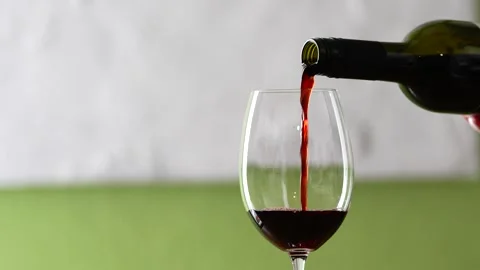 Red Wine Pouring into Glass Macro Close-Up 4K – Luxury Alcohol Drink Stock Footage 332562015