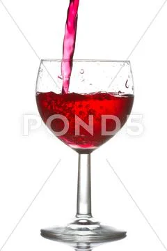 Red wine pouring Stock Photos