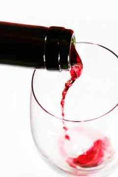 Red wine pouring Stock Photos