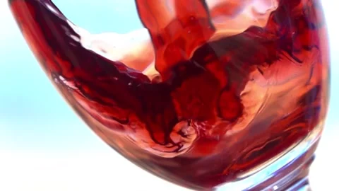 Red Wine Pouring in slow motion Stock Footage 236739099