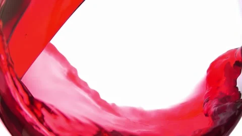 Red wine pouring in a wave against a white background. Stock Footage 333315564