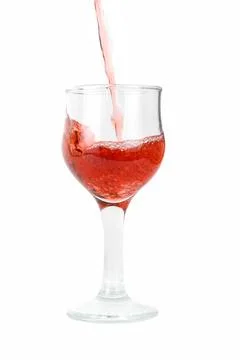 Red wine Red wine being poured into a wine glass isolated on white Copyrig... Stock Photos