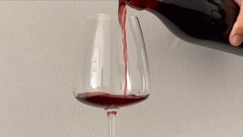 Red wine serving in a glass Video stock 212006671