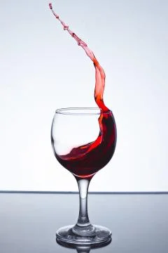 Red wine splash Stock Photos