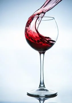 Red wine splashing Stock Photos