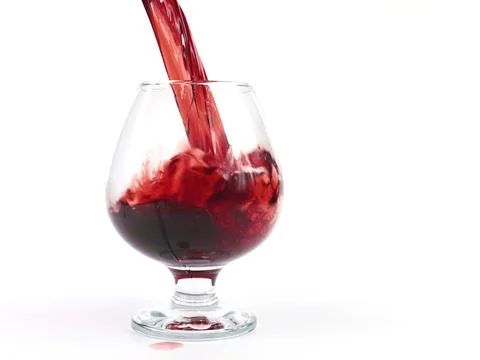 Red wine when poured Stock Photos