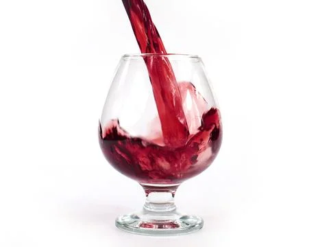 Red wine when poured Stock Photos