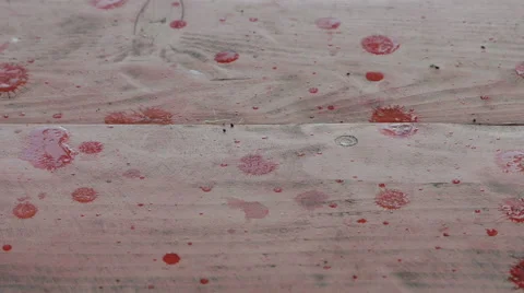 The red wooden surface falling large drops of rain Stock Footage 50035522