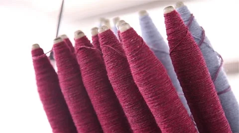 Red wool rolls Stock Footage 56525772