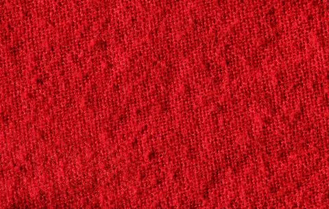 Red wool textured surface background for design Fotos Stock