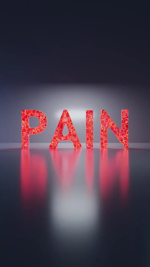 Red word PAIN explodes into small shining particles. Conceptual 3D Stock Footage 257073235