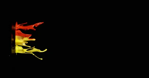 Red &amp; yellow paint in motion in 4K Stock Footage 59921391