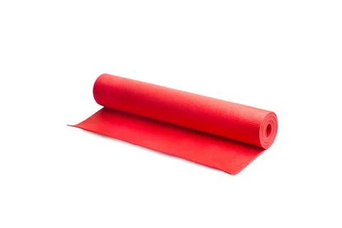 A red yoga mat on a white background with copy space Foto stock