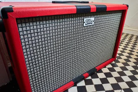 A red Zilla guitar cab. Stock Photos