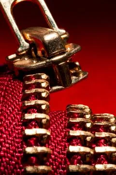 Red zipper in circle macro view Stock Photos