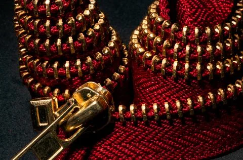 Red zipper macro view as a double choice in a business teamwork building Stock Photos