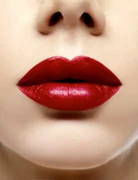 Red_full_lips_close-up Stock Photos
