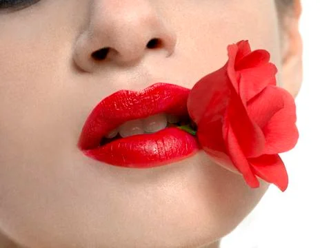 Red_lips_and_red_rose_close-up Stock Photos
