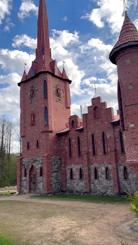 Red‑brick neo‑Gothic castle in Sula History Park, Belarus, architectural landmar Stock Footage 334787120