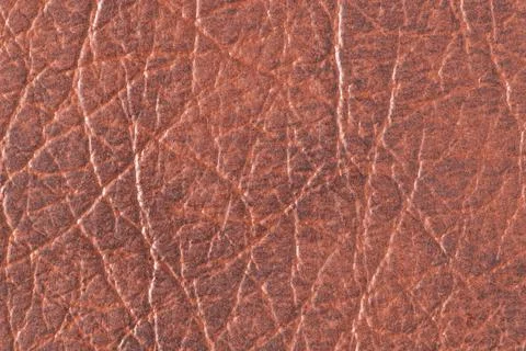 Reddish brown leather texture closeup background Stock Photos