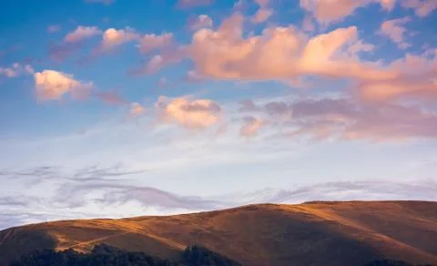 Reddish cloudscape over the mountain top Photos