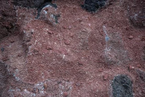 Reddish volcanic stone background Stock Photos