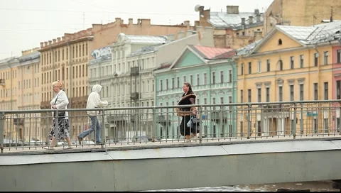 Рedestrian walking on the small pedestrian bridge Видео 5163493